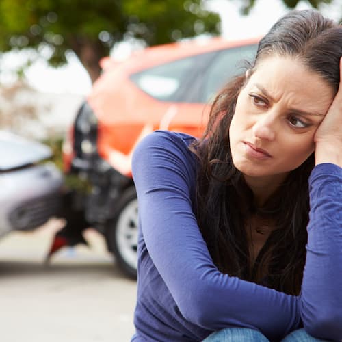 woman worried after a car accident