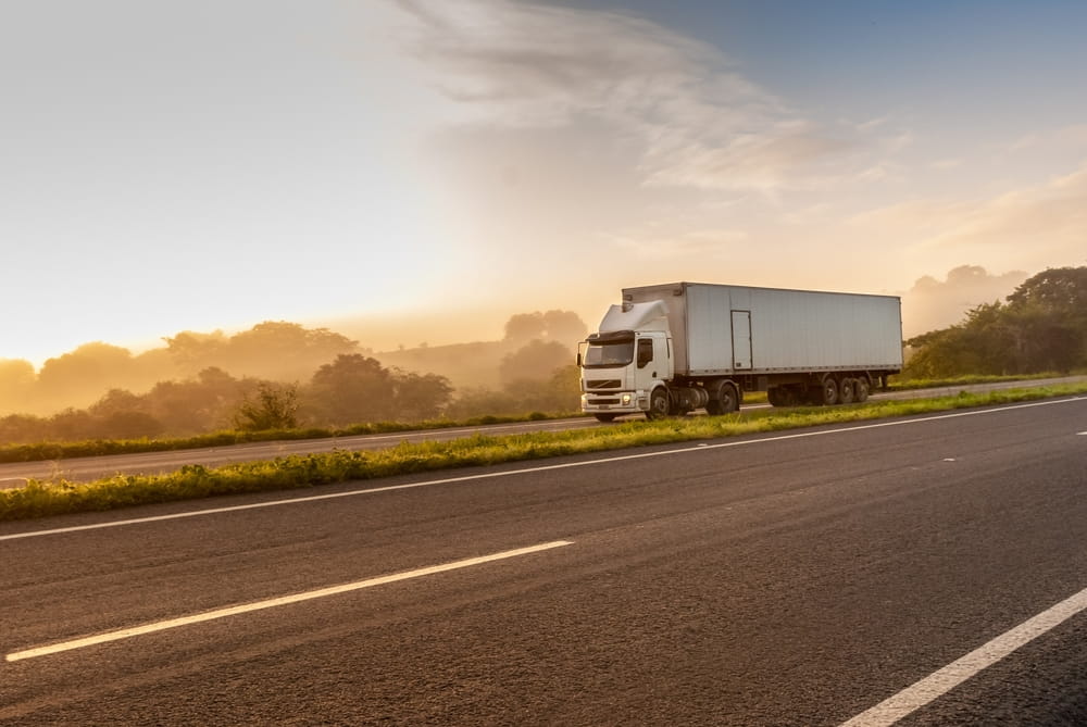 Commercial rental truck traveling on a highway
