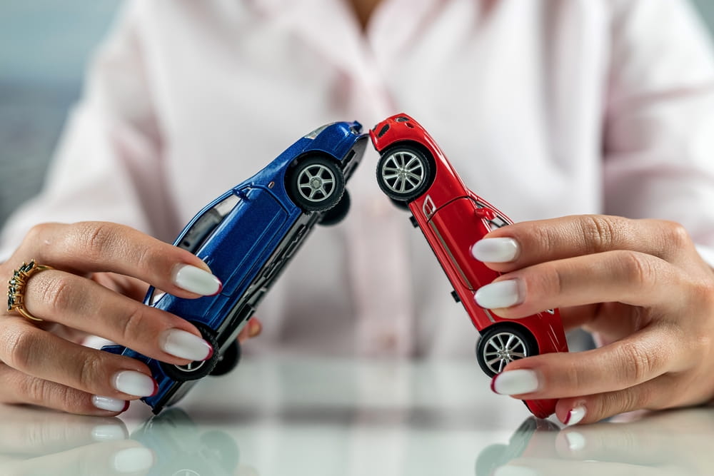 Model vehicles involved in a collision representing a serious motor vehicle accident claim